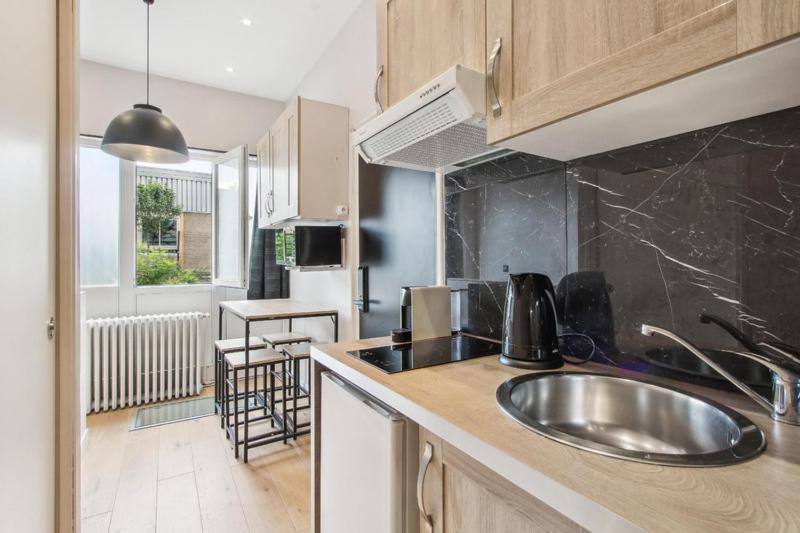 165 Suite Denis - Superbe Appartement A Paris Exteriör bild